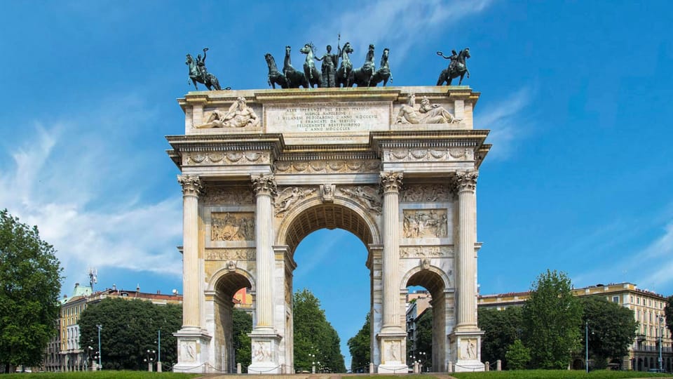 Best of Milan: Private Walking Tour with a Local - Galleria Vittorio Emanuele II: shopping arcade, architecture class, and people-watching