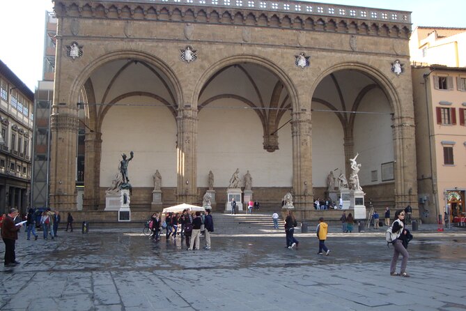 Florence Renaissance and Medieval: Day Trip from Milano by High-Speed Train - Piazza della Signoria: the outdoor museum effect (and the pig-nose tradition)