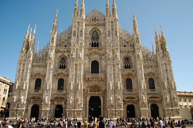 Highlights of Milano Private Walking Tour: Duomo, Castle & Gelato - Piazza Affari and the L.O.V.E. sculpture: Milan’s financial heartbeat