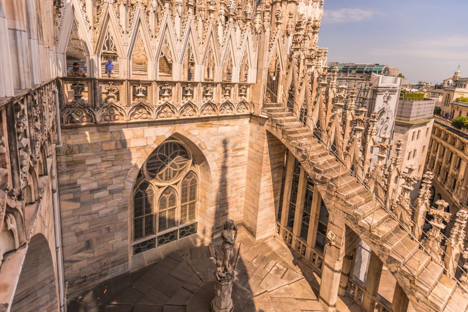 Milan Duomo and Rooftop 2-Hour Guided Tour - From rooftop back to the church: efficient skip-the-line access