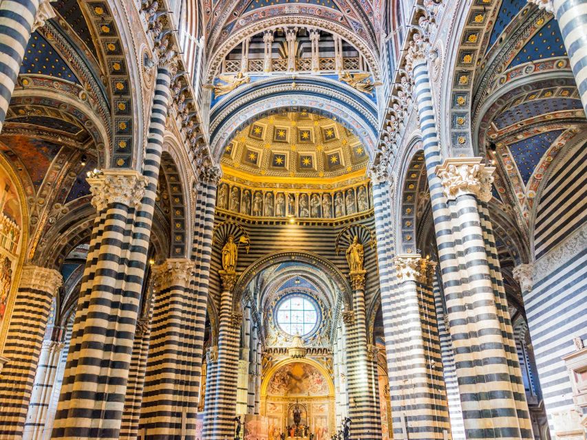 Milan: Guided Cathedral Tour with Rooftop Terraces Access - The standout sculptures: Saint Bartholomew, Medici, and the Golden Madonna
