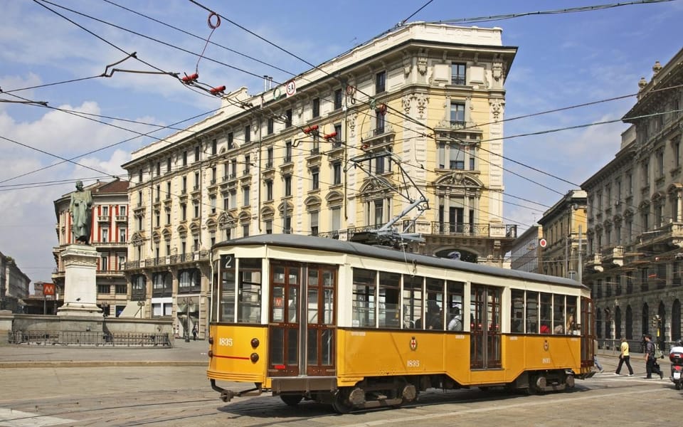 Milan: History & Street Food Tour with Wine Tasting - Local restaurants and platters: cured meats, cheeses, and sweet finish