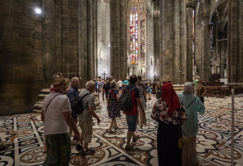 Milan: Scala Theater and Duomo Cathedral Guided Tour - Headsets, timing, and the rain-or-shine reality of a 2-hour walk