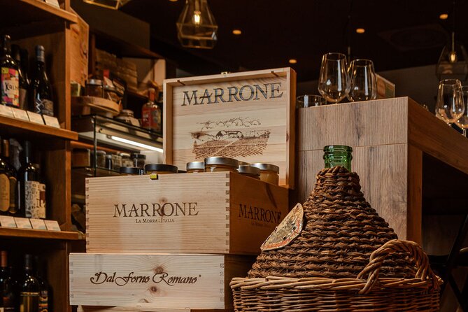 Milan Wine and Food Tasting Experience - Where the Evening Happens: Inside a Cozy Wine Shop Setup